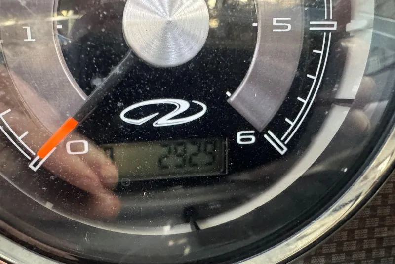 Slide: The Image of Close-up of a Regal 1900 ES Bowrider 2014 speedometer showing 232.9 hours. - 18