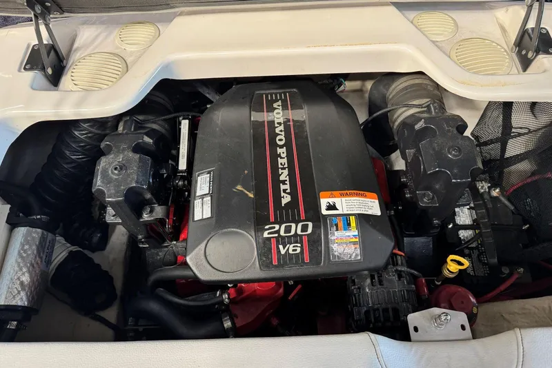 Slide: The Image of Volvo Penta 200 V6 engine in 2014 Regal 1900 ES Bowrider boat. - 25