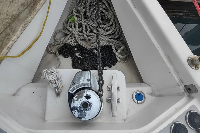 Slide: The Image of Anchor winch and ropes on a 2003 Hunter 356 sailboat deck. - 11