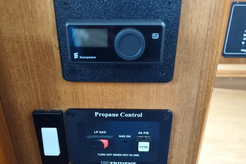 Slide: The Image of Control panel with Eberspächer display and propane control in 2003 Hunter 356 yacht. - 37