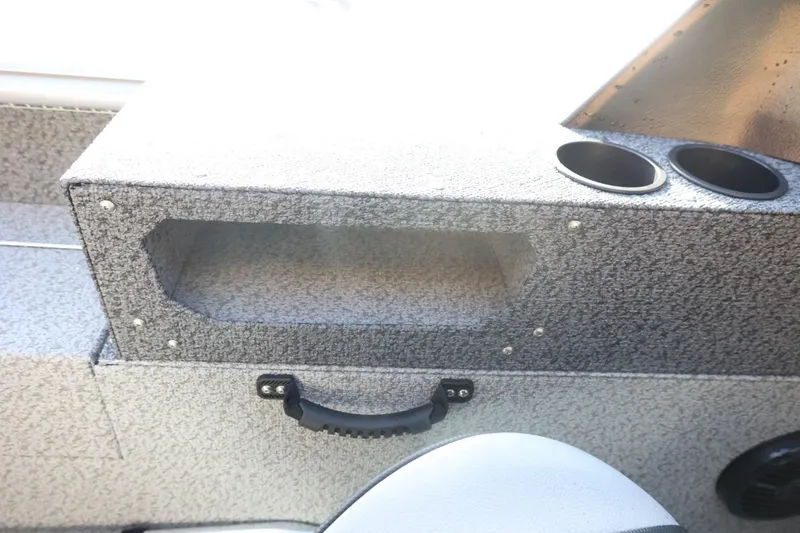 Slide: The Image of Interior storage compartment of 2026 Lund 1875 Impact XS Sport boat. - 26