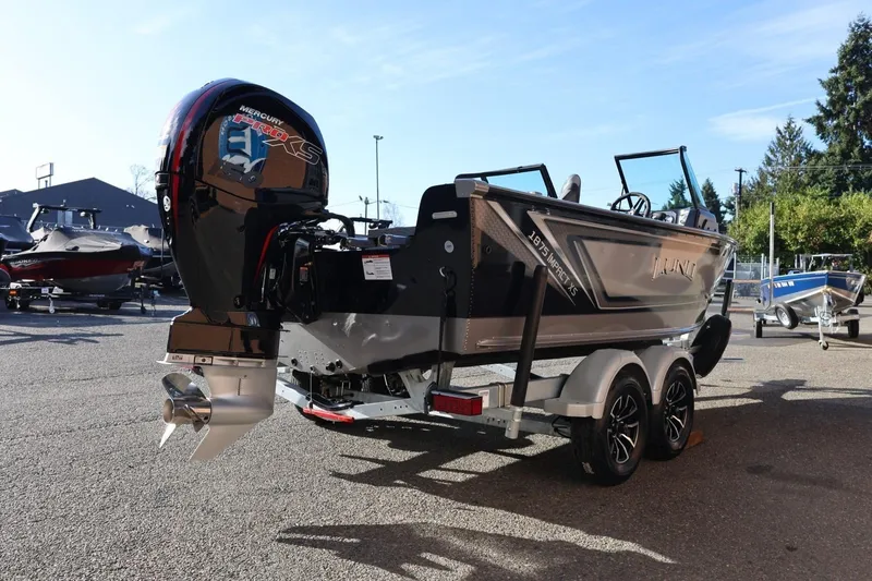 Slide: The Image of 2026 Lund 1875 Impact XS Sport boat with Mercury Pro XS engine on trailer. - 45