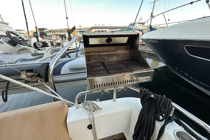 Slide: The Image of Outdoor grill on 2017 Ranger Tugs R-31 CB boat, docked at marina. - 66