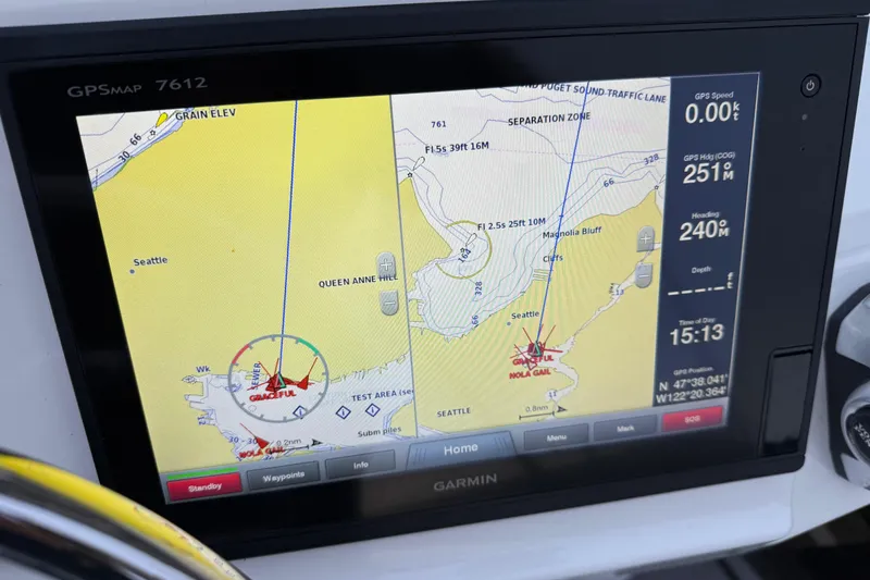Slide: The Image of Garmin GPS display on 2017 Ranger Tugs R-31 CB, showing Seattle navigation map. - 74