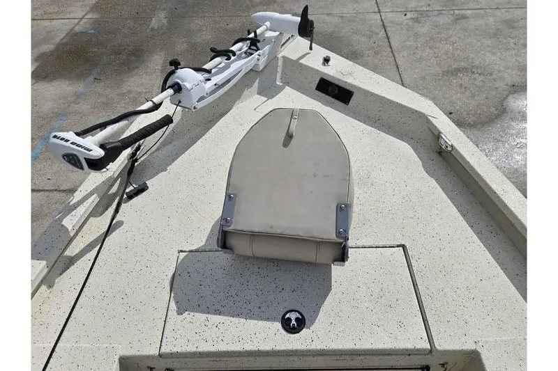 Slide: The Image of Front deck of 2012 Xpress H20 boat with trolling motor and seat. - 10