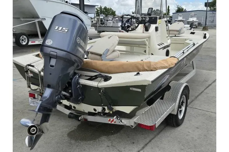 Slide: The Image of 2012 Xpress H20 boat with Yamaha 115 outboard motor on trailer. - 15
