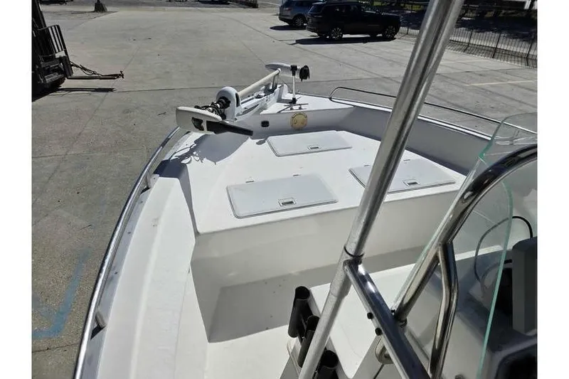 Slide: The Image of 2002 Cape Horn 17 CC boat deck with storage compartments and railing. - 11