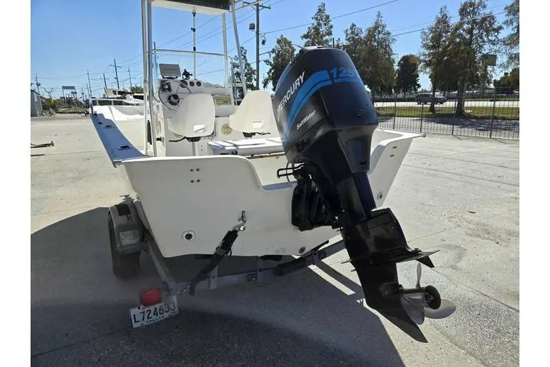 Slide: The Image of 2002 Cape Horn 17 CC boat with Mercury outboard motor on trailer. - 5