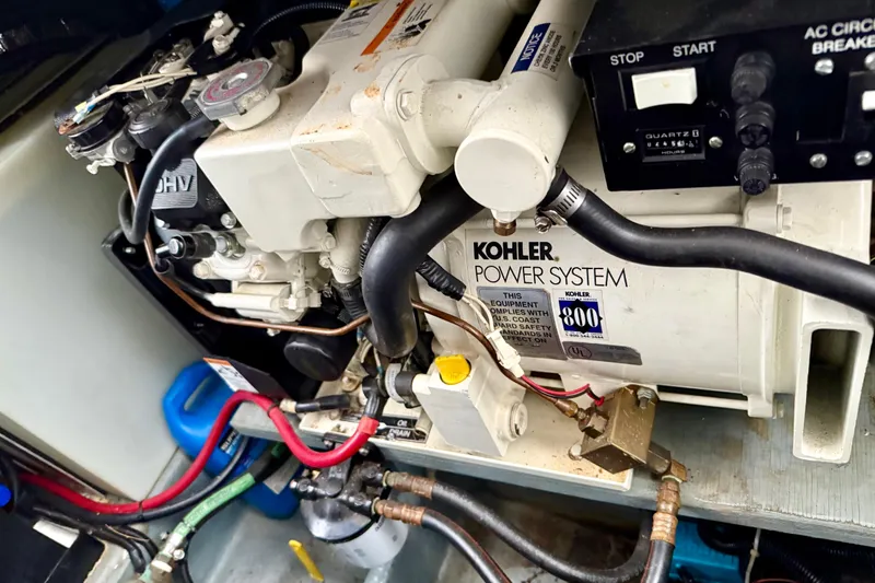 Slide: The Image of Engine compartment of a 2000 Sea Ray 270 Sundancer with Kohler power system. - 25