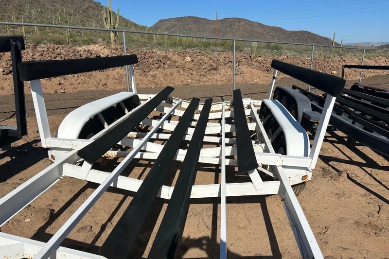 Slide: The Image of Boat trailer for 2000 Sea Ray 270 Sundancer in desert landscape. - 29