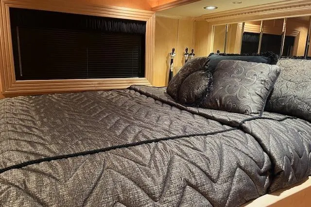 Slide: The Image of Luxurious bedroom interior in 2008 Fantasy Houseboat with elegant bedding and pillows. - 19