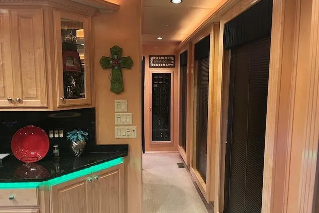 Slide: The Image of Luxurious 2008 Fantasy houseboat interior with wooden cabinets and modern decor. - 25