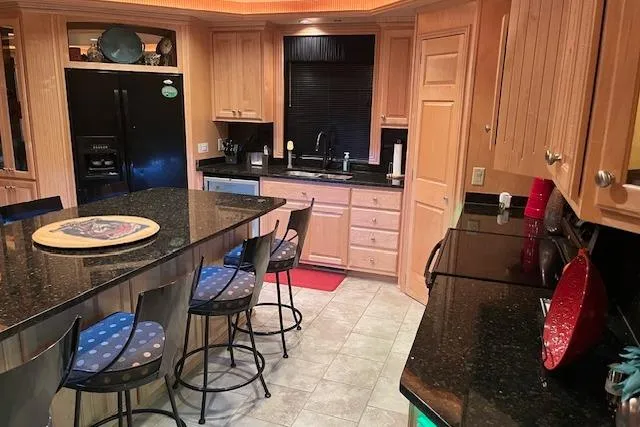 Slide: The Image of Luxurious kitchen in a 2008 Fantasy houseboat with granite countertops and modern appliances. - 6