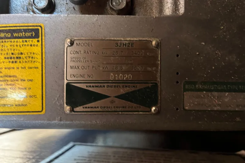 Slide: The Image of Yanmar diesel engine plate on a 1995 Hunter Legend 37.5 sailboat. - 30