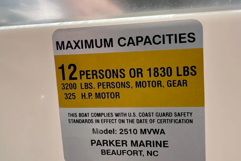 Slide: The Image of Maximum capacity label on 2005 Parker 2510 Walkaround boat, 12 persons or 1830 lbs. - 37