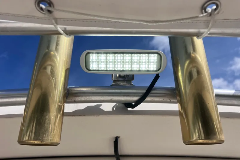 Slide: The Image of LED light and brass fittings on a 2005 Parker 2510 Walkaround boat. - 39