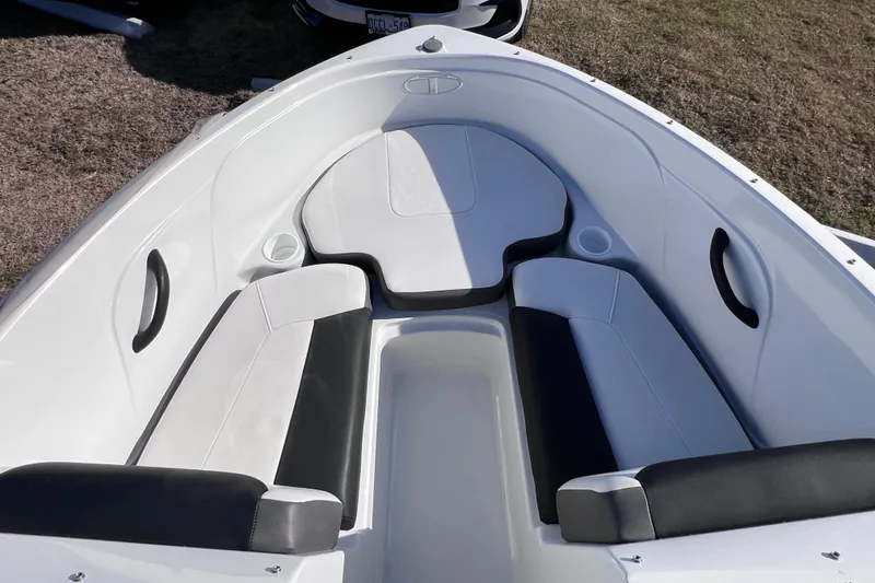 Slide: The Image of 2019 Tahoe 450 TS boat interior with white and black seating. - 23