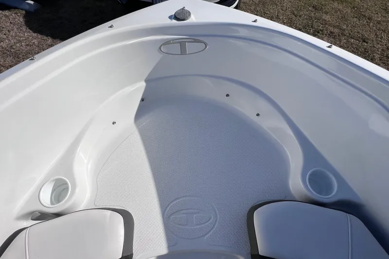 Slide: The Image of 2019 Tahoe 450 TS boat interior with seating and cup holders. - 25