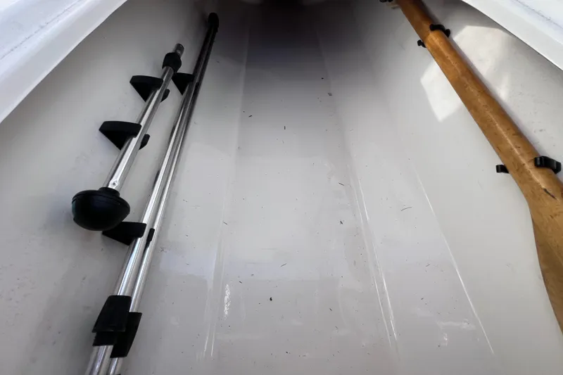 Slide: The Image of Interior of a 2019 Tahoe 450 TS boat with storage compartments. - 29