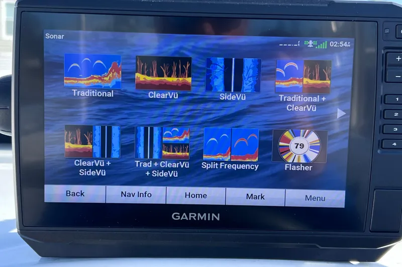 Slide: The Image of Garmin sonar display showing various sonar modes on a Tahoe 450 TS, 2019 model. - 41