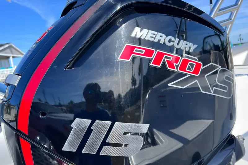 Slide: The Image of Mercury Pro XS 115 outboard motor on a 2019 Tahoe 450 TS boat. - 9