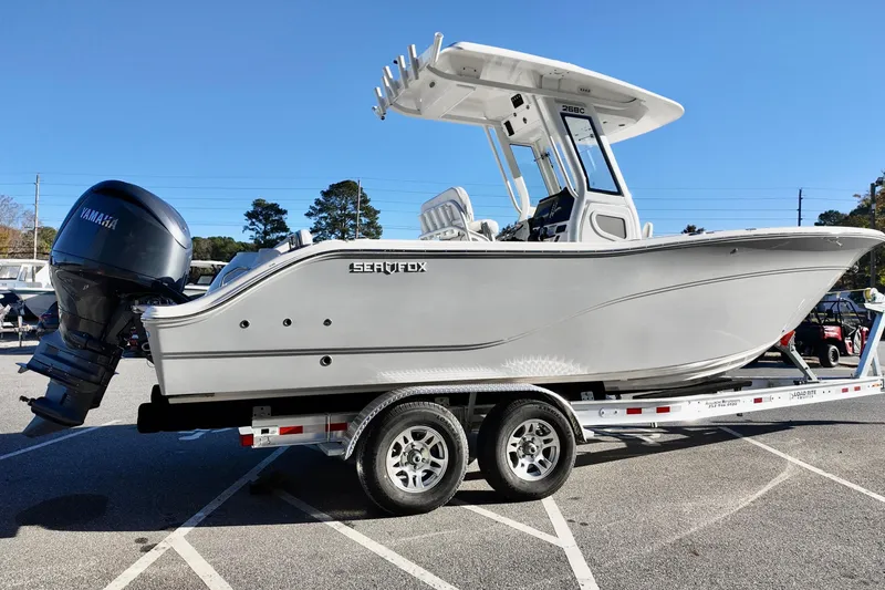 Slide: The Image of 2026 Sea Fox 268 Commander boat on trailer, featuring Yamaha outboard motor. - 2