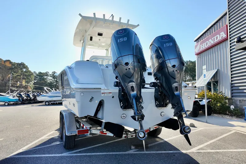 Slide: The Image of 2026 Sea Fox 268 Commander boat with dual 150 horsepower engines at dealership. - 22