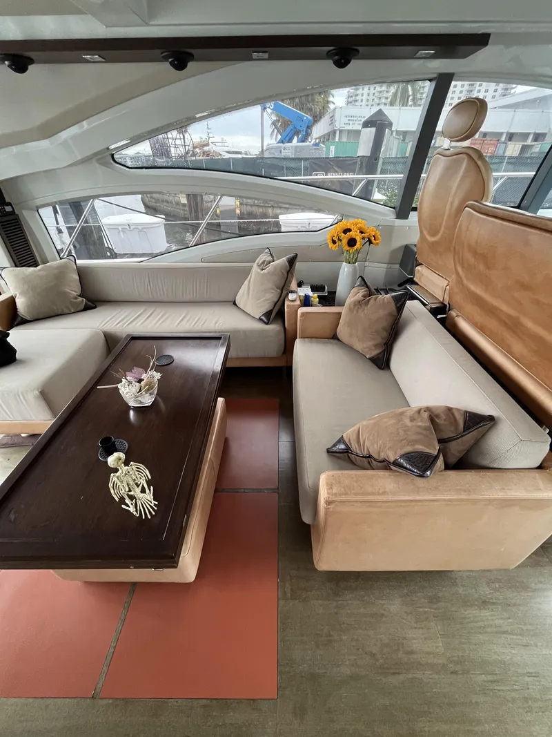 Slide: The Image of Luxurious interior of a 2008 Azimut 62S yacht with elegant seating and decor. - 12