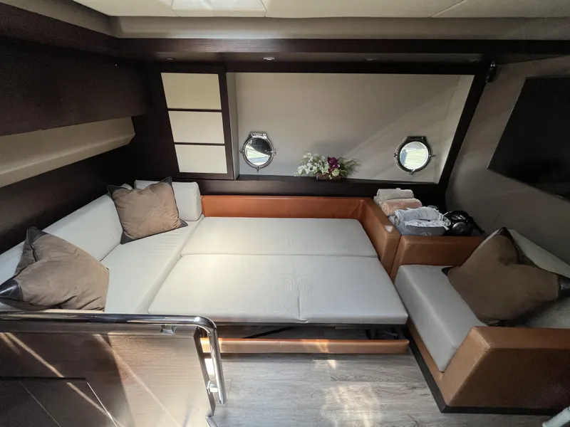 Slide: The Image of Luxurious interior of a 2008 Azimut 62S yacht with elegant seating and decor. - 22