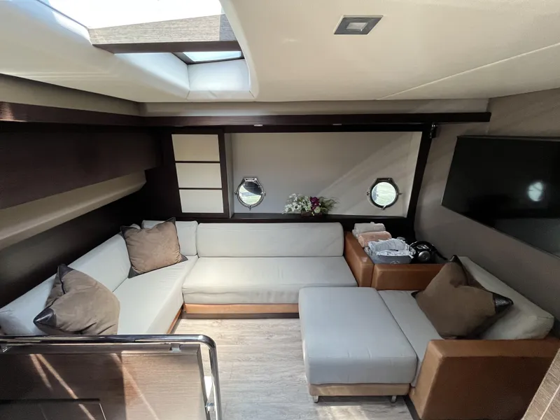 Slide: The Image of Luxurious interior of 2008 Azimut 62S yacht with modern seating and decor. - 23