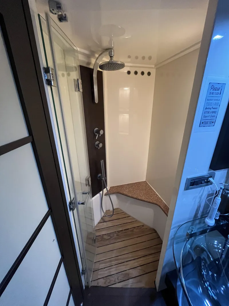 Slide: The Image of Luxurious shower area in a 2008 Azimut 62S yacht with modern fixtures. - 29