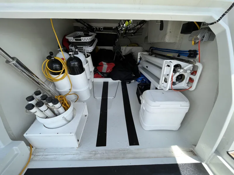 Slide: The Image of Storage compartment of a 2008 Azimut 62S yacht with equipment and supplies. - 39
