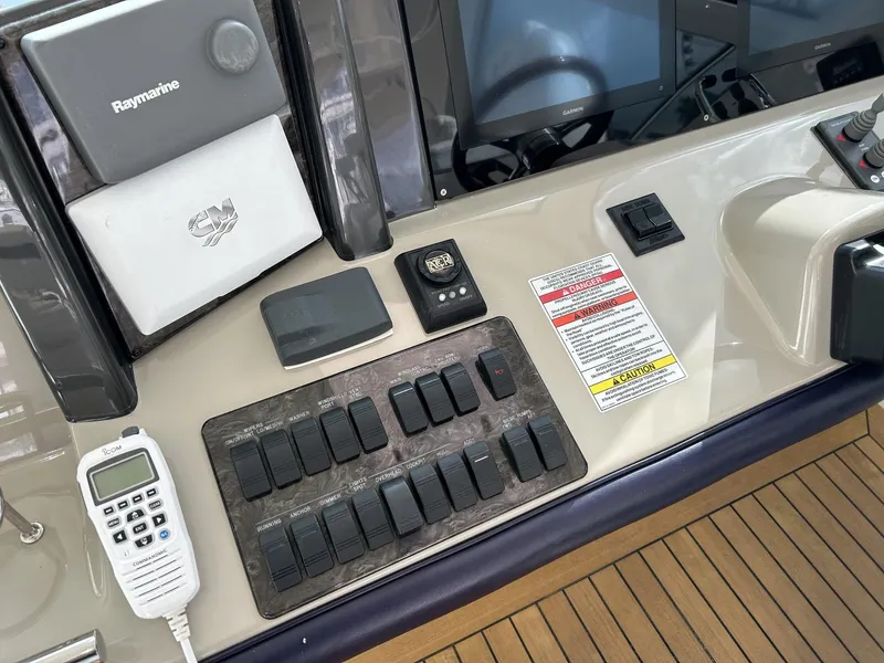 Slide: The Image of Control panel of a 2008 Sea Ray 480 Sundancer yacht with navigation equipment. - 16