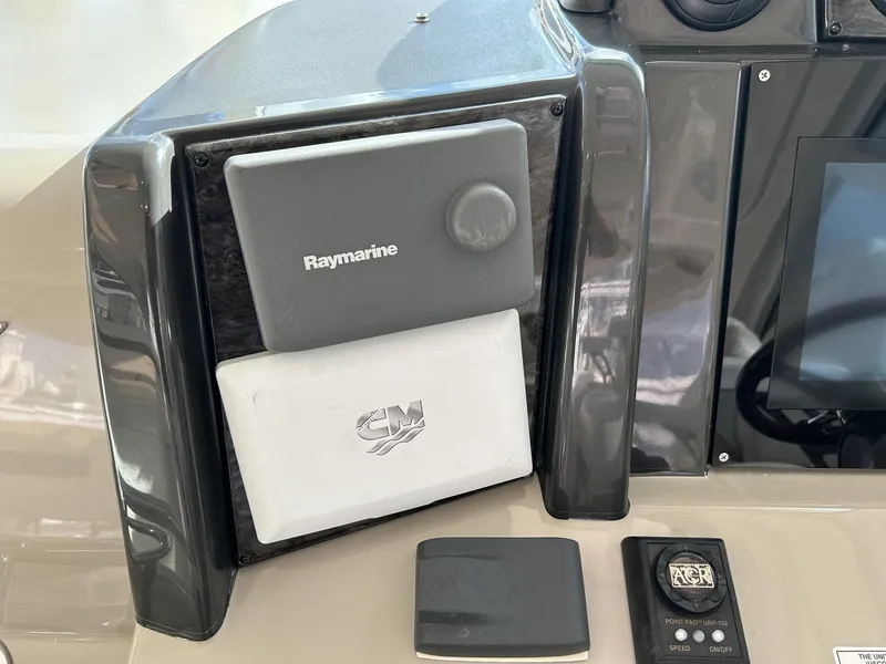 Slide: The Image of Control panel of 2008 Sea Ray 480 Sundancer with Raymarine and CM equipment. - 18