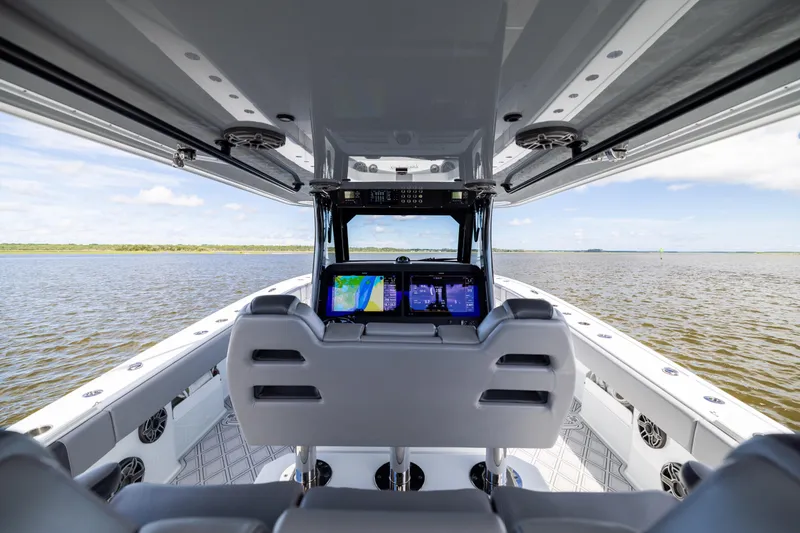 Slide: The Image of Interior view of 2023 Freeman 47 boat with advanced navigation system on open water. - 54