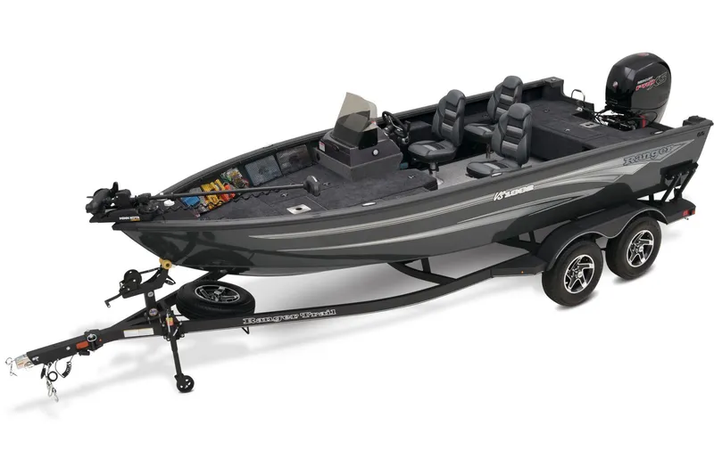 Slide: The Image of 2026 Ranger VS1882SC Reata boat in showroom, red exterior, on trailer. - 1