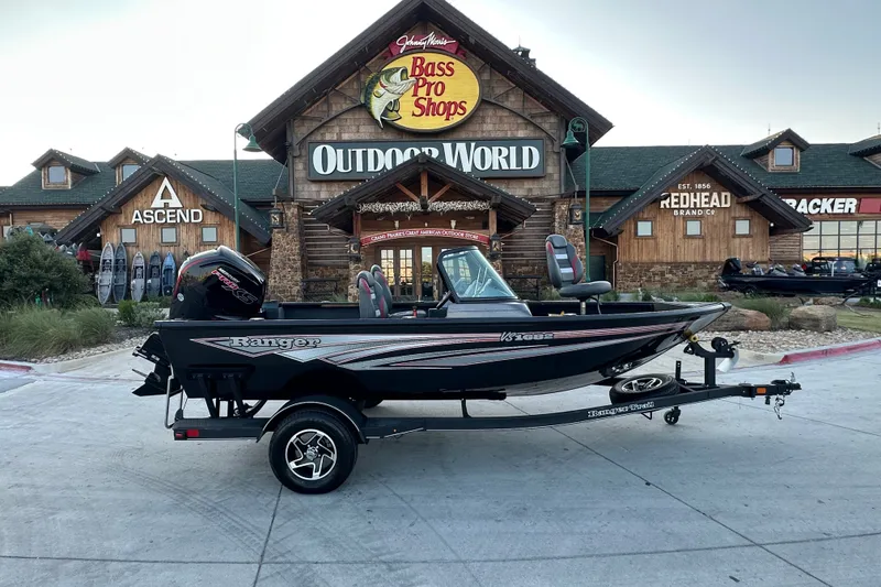 The Image of 2026 Ranger VS1682SC Angler boat displayed outside Bass Pro Shops Outdoor World. - 0