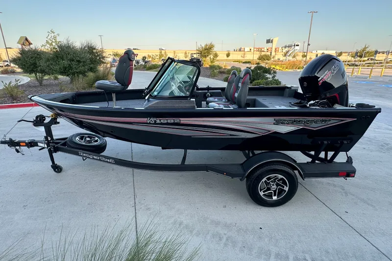 Slide: The Image of 2026 Ranger VS1682SC Angler boat on trailer, parked outdoors. - 3