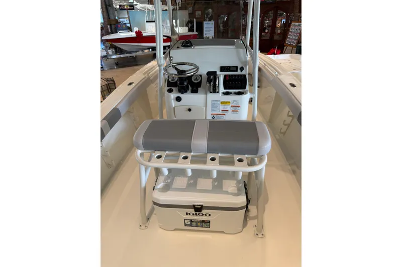 Slide: The Image of 2026 Mako 214 Center Console boat interior with steering wheel and seating. - 3
