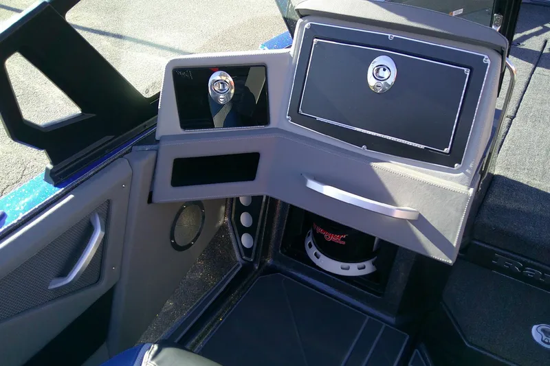 Slide: The Image of 2026 Ranger 621FS Pro boat interior with sleek dashboard and storage compartments. - 13