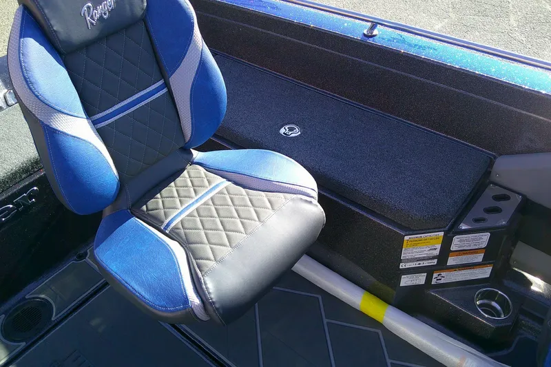 Slide: The Image of 2026 Ranger 621FS Pro boat seat with blue and black upholstery, showcasing premium design. - 16