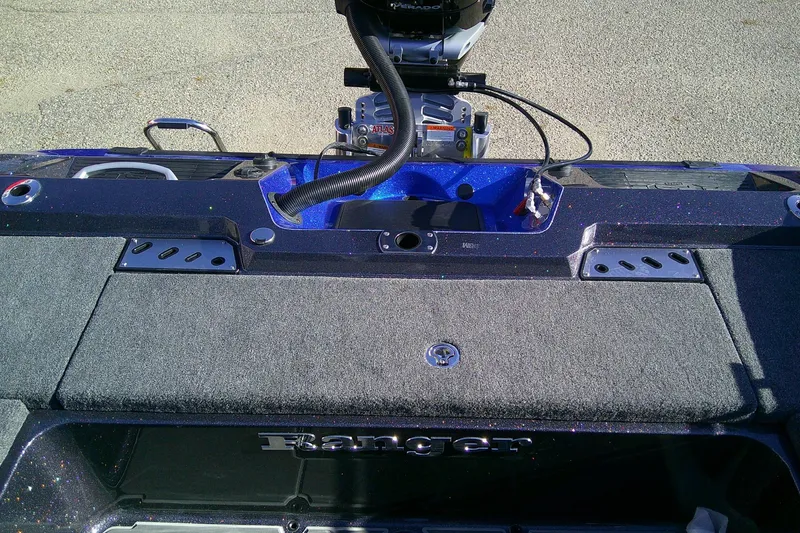 Slide: The Image of 2026 Ranger 621FS Pro boat interior with motor and control panel. - 17