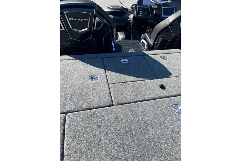Slide: The Image of 2026 Ranger Z520R Cup-Equipped boat interior with gray carpet and sleek dashboard. - 3
