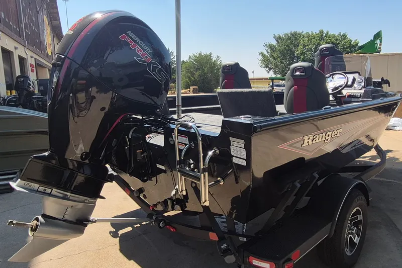 Slide: The Image of 2026 Ranger VS1782SC Reata boat with Mercury Pro XS engine, parked outdoors. - 6