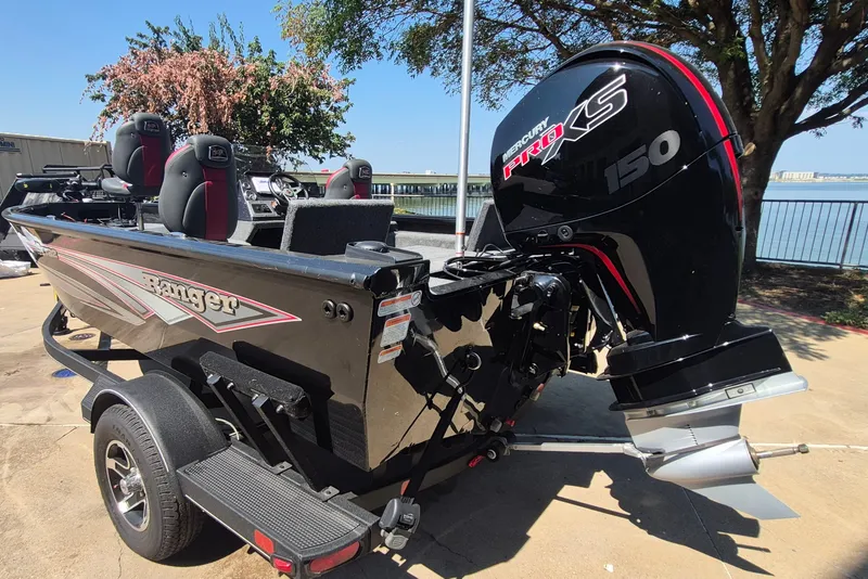 Slide: The Image of 2026 Ranger VS1782SC Reata boat with Mercury Pro XS 150 engine, parked outdoors. - 8