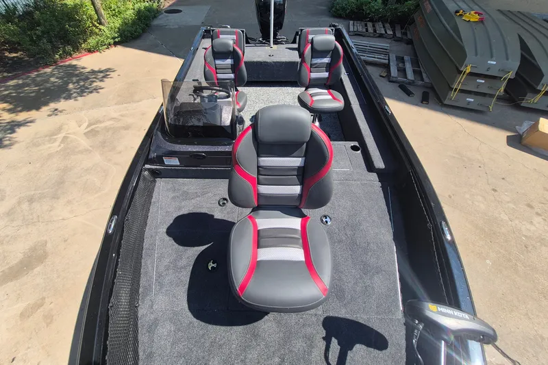 Slide: The Image of 2026 Ranger VS1782SC Reata boat interior with modern seating and carpeted flooring. - 12