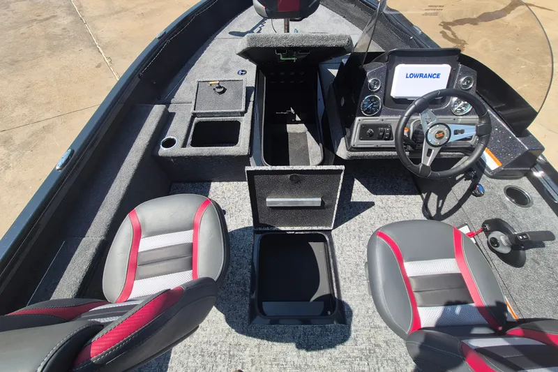Slide: The Image of 2026 Ranger VS1782SC Reata boat interior with steering wheel, seats, and Lowrance display. - 14