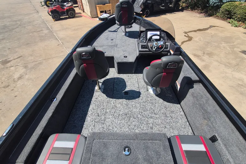 Slide: The Image of 2026 Ranger VS1782SC Reata boat interior with seating and steering console. - 10