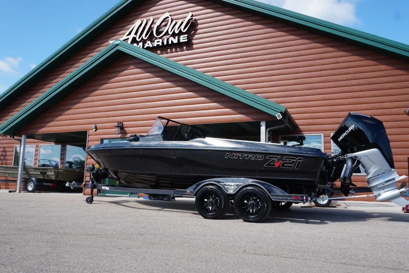 The Image of 2026 Nitro ZV21 Pro boat displayed outside All Out Marine store. - 0