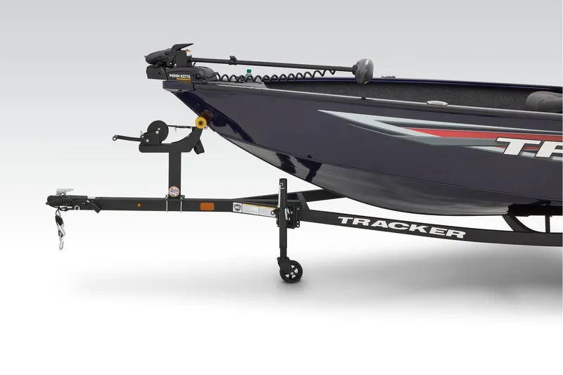Slide: The Image of 2026 Tracker Super Guide V-16 T boat on trailer in parking lot. - 6